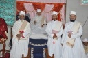 Huzoor-e-'Aali Saiyedna saheb (tus) on Takht-e-Taiyebi with three Shahzada saheb